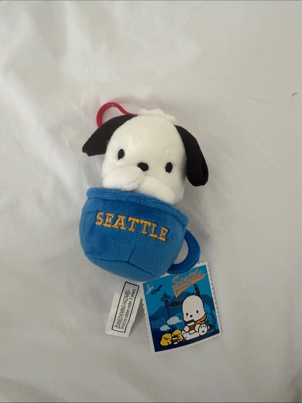 Sanrio Pochacco Seattle Clip Plush Toy | Kinokuniya Seattle Exclusive